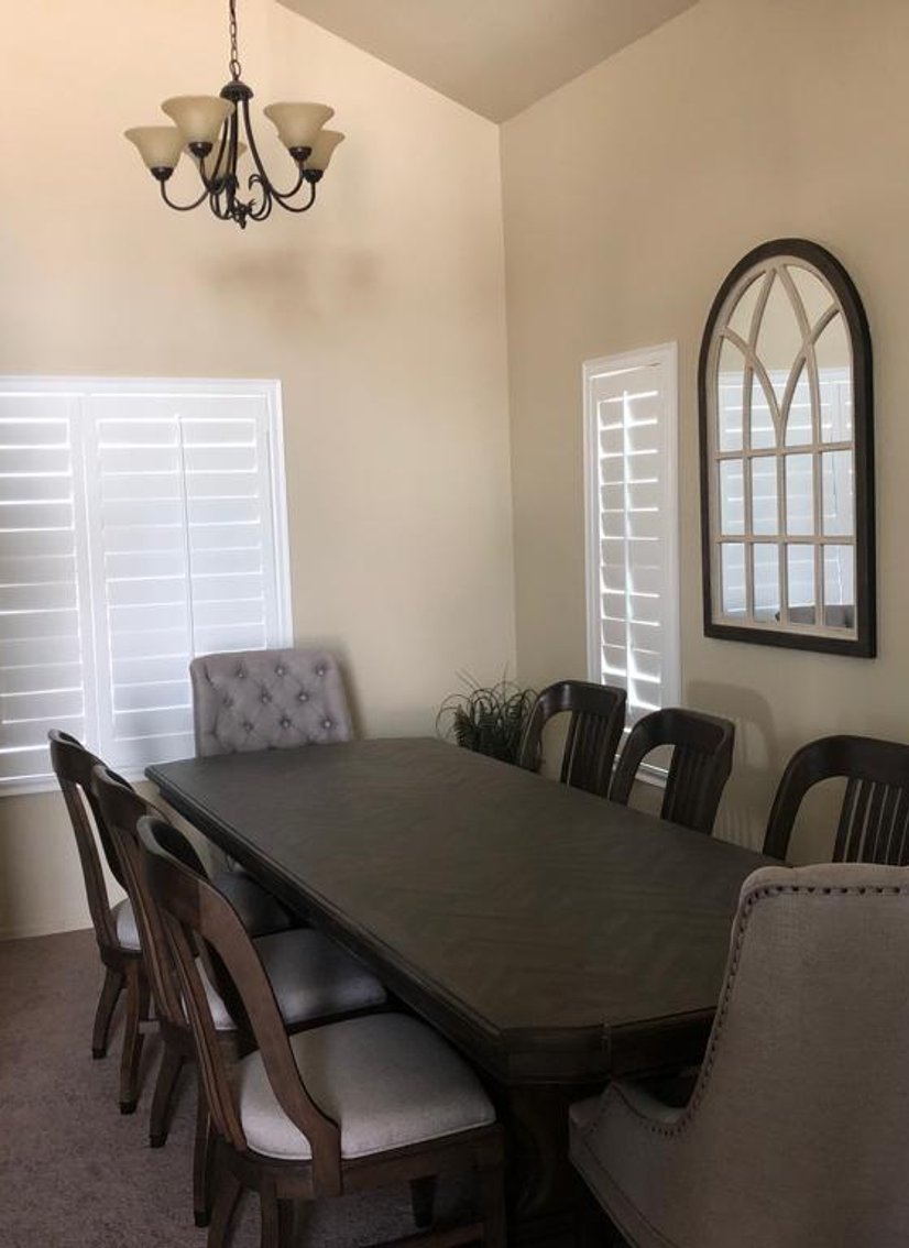 white plantation shutters in a dining room